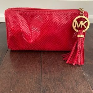 Michael kors red clutch with gold accents